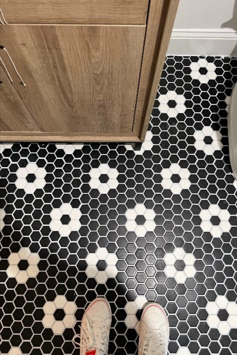 Check out this insane before and after of a 1980s bathroom taken into the 21st century with beauty and a blast from the past! Art Deco Tile, Hexagon Tiles, Daisy Tiles, Classic Bathroom Small Black Hex Tile Bathroom Floor, Flower Hexagon Tile Bathroom, Black And White Flower Tile Bathroom, Daisy Tile Bathroom, Black White Tile Bathroom, Black Hexagon Tile Bathroom Floor, Hexagon Floor Tile Bathroom, Hexagon Mosaic Tile Bathroom, Pastel Bathroom Ideas