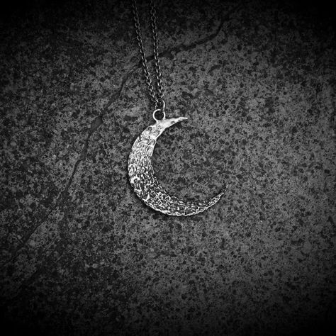 • Lunar Tides • The 'Lunar Tides' necklace is a celebration of all things celestial and textured. Crater like patterns formed by molten wax, the liquidity following the heat much like the tides follow the Moon. This is a re-imaging of the previous textured crescent I made some time ago, but the textures just didn't feel right to me, too angular and precise. These organic, molten textures feel much more fitting. #hexarcana #amuleticarmour #amulet #talisman #talismanicmagic #lunartides #cele... Moon Amulet, Lunar Tide, Crescent Moon Necklace Silver, Path To Nowhere, Crescent Moon Necklace, Leather Chokers, Moon Necklace, Crescent Moon, Natural Oils