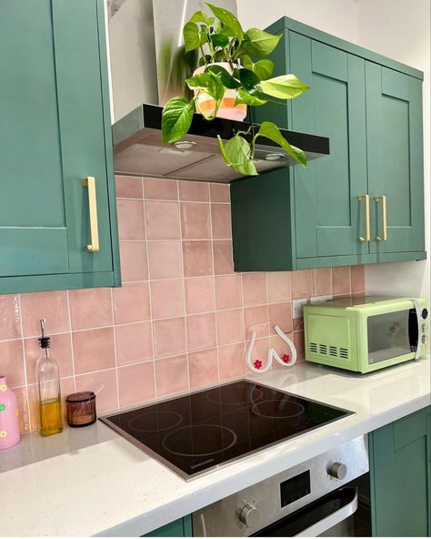 Pink tiles, green cabinets in lick green 04 Vintage Pink And Green Kitchen, Green And Pink Kitchen Decor, Pink And Sage Kitchen, Pink And Green Kitchen Ideas, Kitchen Pink Tiles, Pink Cabinets Kitchen, Pink Tiles Kitchen, Green Keurig, Green Pink Kitchen