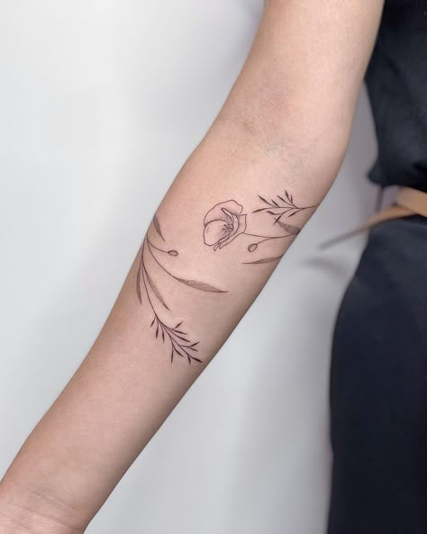 33 Lovely Poppy Tattoo Ideas for Men & Women in 2024 Poppy Flower Tattoo Wrap Around, Wrap Around Poppy Tattoo, Poppy Flower Shoulder Tattoo, Poppy Sleeve Tattoo, Poppy Bouquet Tattoo, Poppy Tattoo Men, Fine Line Poppy Tattoo, Simple Poppy Tattoo, Poppy Tattoo Ideas