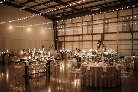 Hangar Party Events, Airplane Hangar Wedding Reception, Hangar Wedding Decor, Airport Hangar Wedding, Metal Shop Wedding Reception, Hangar Wedding Reception, Shed Wedding Reception Decoration, Hangar Reception, Machine Shed Wedding Reception