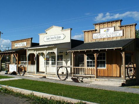 western store front spaced Western Facade, Cowboy Town, Old West Saloon, Metal Shop Building, Old Western Towns, Metal Building Kits, Old West Town, Metal Barn Homes, Western Saloon