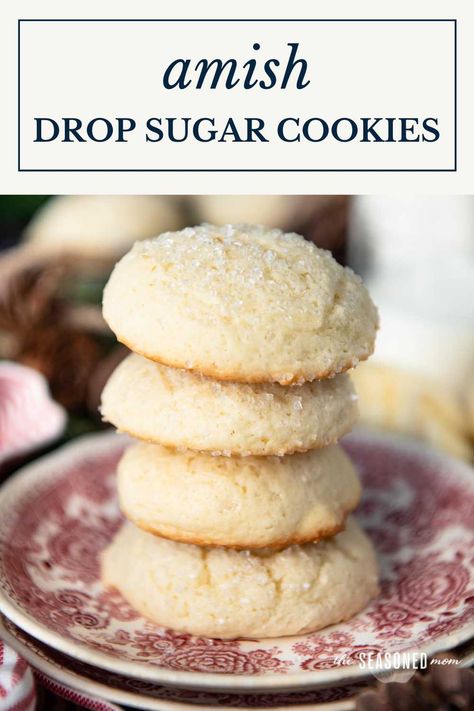 Amish drop sugar cookies are thick, puffy, soft, and coated in sparkling sugar! You can frost them, glaze them, or add sprinkles, too. Perfect for Christmas cookie trays and just about any other holiday celebration! Puffy Sugar Cookie Recipe, Sugar Cookies With Sour Cream, Easy Drop Sugar Cookies, Cookies With Sour Cream, Christmas Cookie Trays, Drop Sugar Cookie Recipe, Sugar Cookie Glaze, Powdered Sugar Cookies, Xmas Cookies Recipes