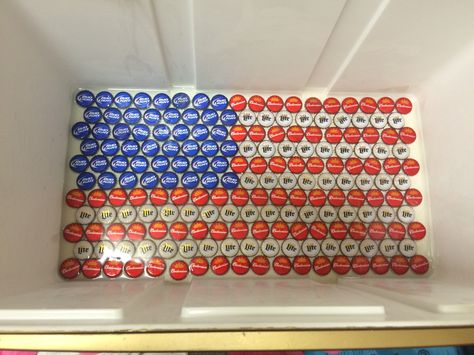 Bottom (inside) of a frat formal cooler. I bought the beer caps on eBay, glued  them down with just enough glue to hold them in place, then poured resin over the caps. I bought the resin mixture from amazon. American Flag fraternity frat cooler formal sorority Painted Fraternity Coolers, Nola Cooler, Formal Sorority, Sorority Coolers, Frat Formal, Beer Pong Table Designs, Painted Coolers, Cool American Flag, Formal Cooler Ideas