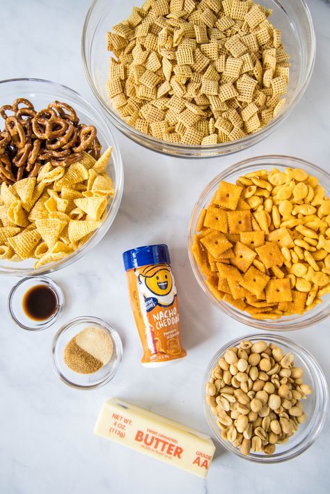 This Homemade Cheese Chex Mix is loaded with all your favorite salty and crunchy snacks and tossed with a buttery cheese mixture. The perfect snack that is so much better than store bought! Chex Mix Recipes Cheddar, Homemade Cheddar Chex Mix Recipe, Quaker Snack Mix Baked Cheddar Recipe, Cheddar Chex Mix Homemade, Cheddar Cheese Chex Mix Recipe, Cheese Chex Mix Recipes, Cheesy Chex Mix Recipes, Cheddar Chex Mix Recipe, Cheese Chex Mix