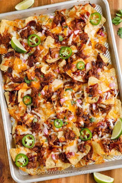 Nothing beats these pulled pork nachos loaded with BBQ sauce, jalapeno peppers, juicy morsels of flavorful pork, and golden melted cheese. Pulled Pork Nachos Recipe, Pulled Pork Sauce, Nachos Loaded, Nacho Recipes, Easy Pulled Pork, Homemade Bbq Sauce Recipe, Pulled Pork Nachos, Slow Cooker Bbq Chicken, Pork Nachos