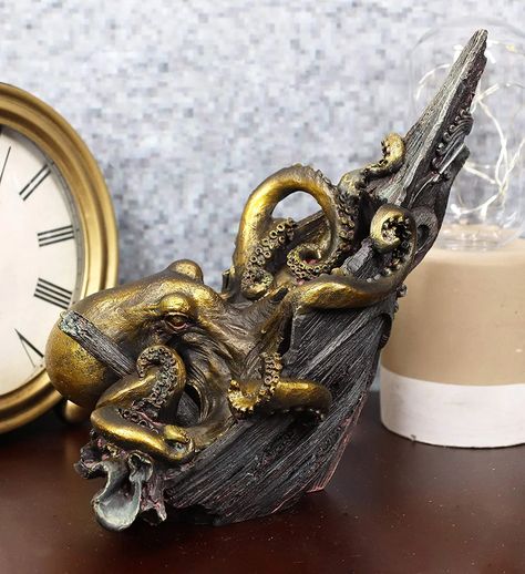 https://www.wayfair.com/decor-pillows/pdp/breakwater-bay-shipwrecked-giant-octopus-kraken-sinking-ferry-ship-bow-decorative-paperweight-statue-75-tall-fictional-crushed-nautical-disaster-memorial-monument-replica-desktop-figurine-w004869393.html Dark Ocean Bathroom, Kraken Decor, Bathroom Decor Hobby Lobby, Pirate Bathroom Decor, Deep Sea Diver Art, Bedroom Wishlist, Dark Nautical, Sea Core, Octopus Bathroom