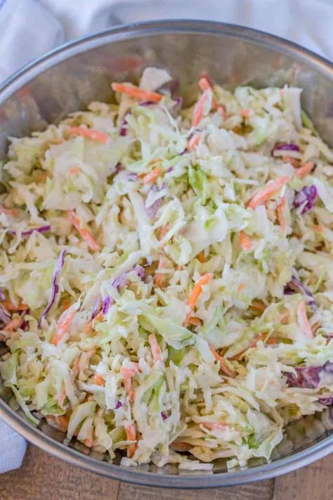 Easy Cole Slaw made in just 5 minutes with the perfect homemade dressing, this is the ultimate side dish for summer and bbqs. | #coleslaw #southerncoleslaw #sidedish #summerrecipes #bbqrecipes #easysummerrecipes #classiccoleslaw #dinnerthendessert Homemade Slaw Dressing, Picnic Sides, Keto Cole Slaw, Traditional Coleslaw Recipe, Coleslaw Dressing Recipe, Best Coleslaw Recipe, Coleslaw Recipes, Slaw Salad, Homemade Slaw