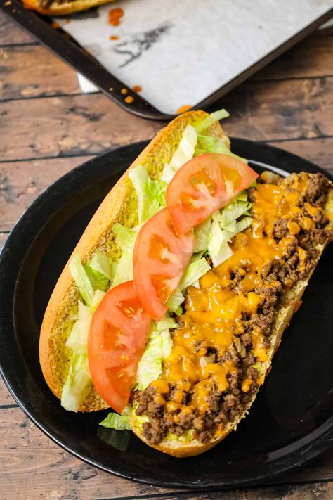 Cheeseburger Subs are an easy family friendly dinner recipe loaded with ground beef, shredded cheddar cheese on a bun spread with a special mayo sauce. Hamburger Subs, Cheeseburger Subs Ground Beef, Meals With Hoagie Buns, Ground Beef Hoagie Recipes, Cheese Burger Subs Ground Beef, Ground Beef Grilled Cheese Sandwich, Cheeseburger Subs, Hoagie Recipes, Bacon Cheeseburger Garbage Bread