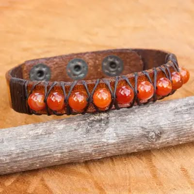 UNICEF Market | Hand Crafted Carnelian and Leather Band Bracelet - Rock Walk in Orange Diy Leather Bracelet, Casual Bracelets, Leather Jewelry Diy, Leather Wristband, Brown Bracelet, Leather Scraps, Leather Wristbands, Wristband Bracelet, Leather Art