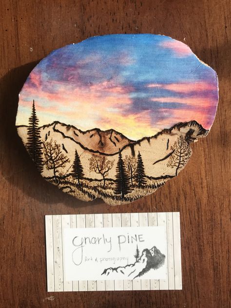 Pyrography. Wood burned mountain scene. Sunset sky. Pyrography Mountain Scene, Wood Burned Mountain Scene, Mountains Wood Burning, Mountain Wood Burning, Wood Burning Table, Pyrography Landscape, Wood Burning Mountain Scene, Wood Burning Landscape, Burning Mountain