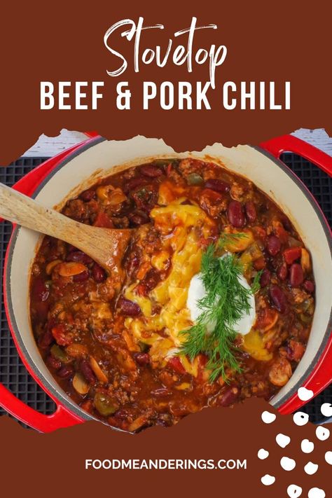 chili with cheese, sour cream and dill in a pot with a wooden spoon Chili With Ground Pork And Beef, Chili With Beef And Pork, Slow Cooker Ground Pork Recipes, Beef And Pork Chili Recipe, Crock Pot Stew Recipes, Healthy Chowder, Stewing Beef Recipes, Crock Pot Chili Recipes, Stove Top Chili