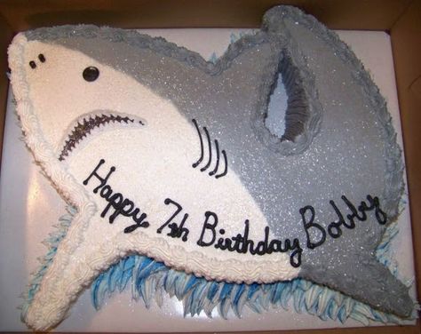 Step #1: Spend two weeks worth of nap time scouring the Internet for images of shark cakes. Realize that this is the best one that you can f... Cute Shark Birthday Cake, Diy Shark Cake, Shark Cakes, Shark Birthday Cakes, Shark Head, Shark Themed Birthday Party, Shark Cake, Aquatic Creatures, Shark Birthday Party