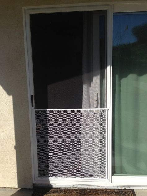 Custom Sliding/rolling screen door with a pet grille installed. Screen Door Grill, Patio Screen Door, Wood Screen Door, Wooden Screen Door, Diy Screen Door, Door Grill, Glass Wall Shelves, Sliding Screen Doors, Metal Grill