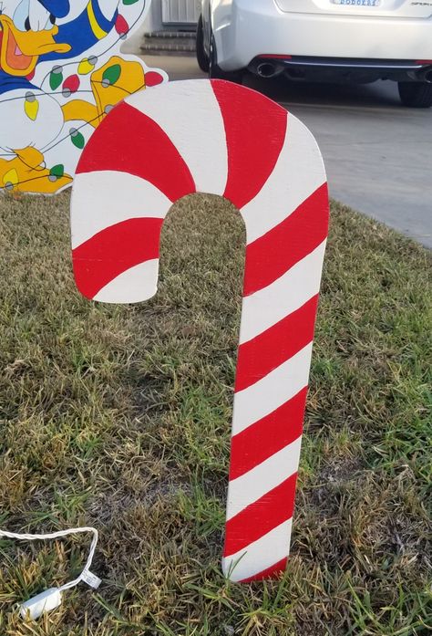 Candy cane wood cutout Candycanes Diy, Wooden Candy Canes, Wooden Christmas Yard Decorations, Candy Cane Wooden Yard Decor, Yule Decor, Giant Candy Cane, Diy Yard Decor, Candy Cane Cards, Diy Christmas Candy