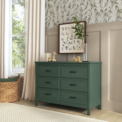 The Charlie 6-drawer Dresser is the perfect accent piece for your nursery or any room in your home. It features six drawers with generous storage capacity and classic metal pulls. With its timeless design, this dresser will complement any bedroom furniture. daVinci Colour: Forest Green | daVinci Charlie 6 Drawer 46.625" W Double Dresser Brown/gray/Green 33.875 x 46.625 x 19.75 in, New Zealand Pine Wood | CBHA1289_82572662 | Wayfair Canada Arched Crib, Kid Dresser, Forest Room Decor, Green Sofa Living, Matching Dressers, Forest Room, Green Dresser, Baby Dresser, Nursery Room Design