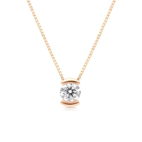 Modern and sophisticated, this necklace is a captivating look any woman would adore. Beautifully crafted, this ring features a dazzling 0.57carat center stone placed prominently in a 18K rose gold half-bezel setting that enhances the diamond's size and sparkle.  This classic look is one she'll turn to often, every day, and on special occasions. An amazing and thoughtful anniversary gift for your loved one. 0.57 carat round brilliant cut D SI1 -CGL report 18k rose gold We offe Modern Diamond Pendant, Necklace Design Ideas, Unique Diamond Pendant, Half Bezel Setting, Diamond Pendant Jewelry, Round Diamond Pendant, Solitaire Diamond Pendant, Diamond Pendants Designs, Half Bezel