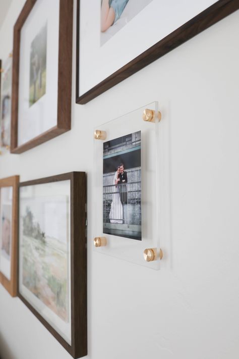 These clear acrylic floating frames are the perfect minimalist picture frames for your favorite artwork or photos - they keep the focus on what matters most, your memories! The acrylic frames are floating frames hung on the wall and perfectly display your pictures. Pictures can easily be changed out as well. And we include your photo already installed inside of it! NEED A SIZE NOT LISTED? Just fill out our contact us form and we can create any size you need. HANG WITH EASE - We pride ourselves in making our products easy to use and install. Every frame you buy will come with an easy to use mounting template so you can easily align your frames and level them on wall (all of the holes are pre-marked for drilling). We also include another template which helps you easily center your photo onto