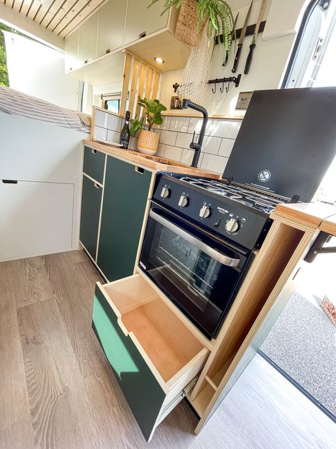 Beautiful scandi ply wood kitchen with oven, sink and fridge, plenty of storage Camper Van Kitchen Storage, Van Build Kitchen, Campervan Cupboard Ideas, Van Conversion Storage, Swb Van Conversion, Camper Kitchen Storage, Caravan Kitchen Ideas, Campervan Sink, Campervan Kitchen Ideas