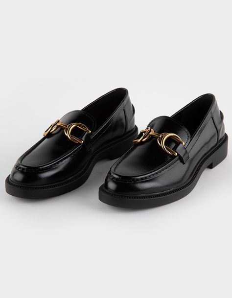 Steve Madden Swamie Loafers. Crafted With High-Quality Faux Leather, These Loafers Offer A Sleek And Polished Look That's Perfect For Any Occasion. Featuring Elegant Gold Buckle Detailing, These Loafers Add A Hint Of Glamour And Refinement To Your Ensemble. The Classic Loafer Silhouette Provides Timeless Appeal, While The Slip-On Design Ensures Easy On-And-Off Wear For Busy Days. Cushioned Footbed. Rubber Outsole. Crafted With All Man Made Materials. Imported.