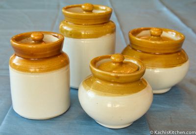 traditional ceramic jars. Hand me downs from amma may be! Indian Ceramic Crockery, Ceramic Pickle Jar, Indian Crockery, Wedding Rukhwat, Save Soil, Tiffin Lunch Box, Christmas Dinner Set, Hand Me Downs, Indian Ceramics