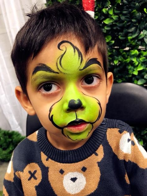 Penguin Face Paint Easy, Face Paint Grinch, Christmas Face Painting Easy Cheek Art, Reindeer Face Paint Easy, Face Painting Christmas Easy, Xmas Face Paint, Christmas Unicorn Face Paint, Face Painting Ideas For Kids Christmas, Grinch Makeup Kids