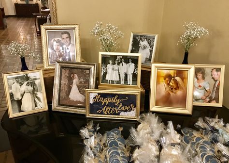 Parents’ and Grandparents’ wedding photos on display: “Happily Ever After” Parents Grandparents Wedding Pictures, Parent And Grandparent Wedding Photos, Parents And Grandparents Wedding Photos Display, Parents And Grandparents Wedding Photos, Old Family Wedding Photo Display, Wedding Photos Of Parents And Grandparents, Family Photos At Wedding Display, Generations Of Love Wedding Table Display, Weddings Through The Years Display