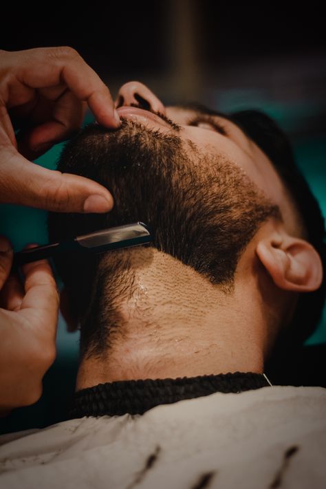 Barber shaving the neck of the client Man Shaving Aesthetic, Men's Barber Shop, Hot Towel Shave Barbers, Mens Hair Salon, Tapered Beard, Popular Beard Styles, Types Of Facial Hair, Best Barber Shop, Growing Facial Hair