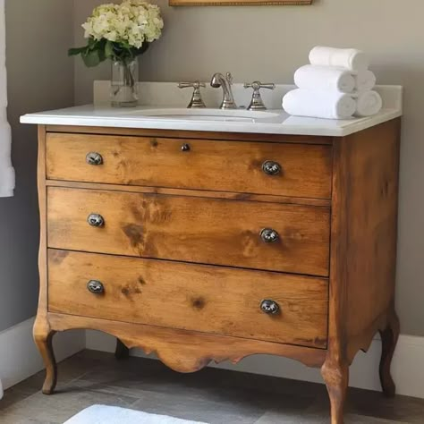 Introduction Transforming a vintage dresser into a custom bathroom vanity is a fantastic way to combine style and functionality while adding a unique touch to your bathroom. Not only does ... Read more Antique Oak Dresser Vanity, Dresser As Sink Vanity, Convert Cabinet To Bathroom Vanity, Dresser Turned Into Bathroom Vanity Farmhouse, Vintage Dresser Bathroom Sink, Farmhouse Bathroom Vanity Colors, Bathroom Vanities Made From Old Dressers, Old Dresser Turned Bathroom Vanity, Antique Dresser To Bathroom Vanity