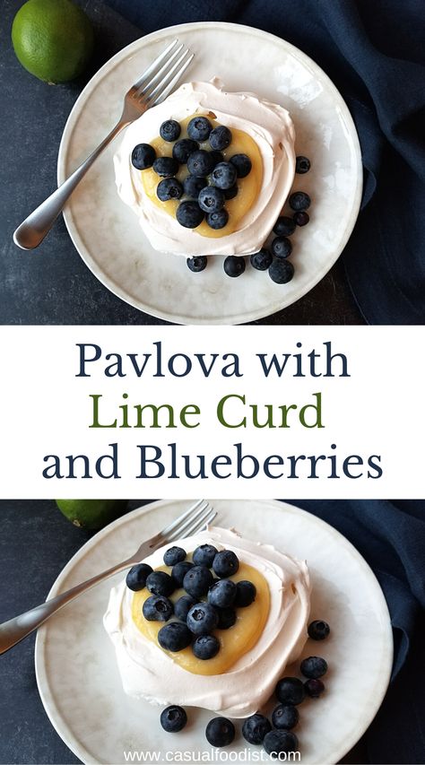 These Mini Pavlova with Lime Curd and Blueberries are the perfect dessert. Light as air meringue is topped with bright lime curd and fresh blueberries. Naturally gluten free and easy to make, learn how to make perfect pavlova at home.| Mini Pavlova Recipe | Easy Pavlova | Meringue Recipe | Gluten Free Dessert Ideas | Mini Pavlova presentation | mini pavlova decoration | mini pavlova idea | Gluten Free Dessert Ideas, Pavlova Recipe Easy, Easy Pavlova, Lime Curd, Dessert Light, Mini Pavlova, Meringue Recipe, Pavlova Recipe, Popular Desserts