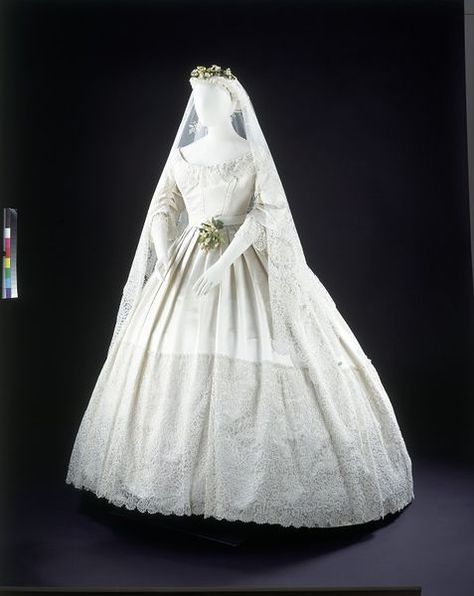 The white wedding dress wasn't always en vogue. In fact, it wasn't until Queen Victoria wore a white gown to her own wedding that it became such a big deal. Not only was it a big deal because the queen wore it, but because wearing white meant one had money. Darker colors could be worn several times without being washed 1800s Wedding Dress, 1800s Wedding, Historical Wedding Dresses, Princesa Margaret, Historical Wedding, Antique Wedding Dresses, Wedding Gown Preservation, Victorian Wedding Dress, 1860s Fashion