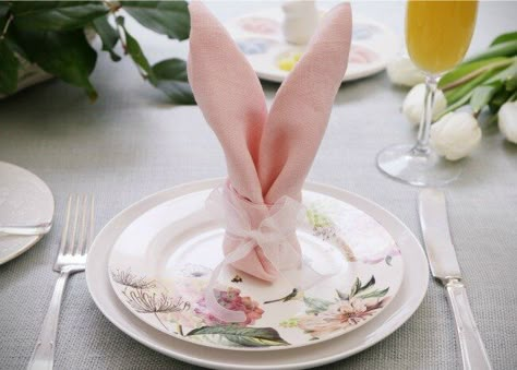 bunny-napkin-on-plate-video-by-allrecipes-650x465 Folding Napkins Into Bunnies, Easter Table Napkins, Kids Easter Table Setting, Easter Buffet Table, Easter Table Decorations Centerpieces, Napkins Ideas, Easter Napkin Folding, Easter Tables, Bunny Napkin Fold