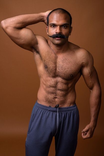 Portrait of muscular indian man with mus... | Premium Photo #Freepik #photo #shirtless-man #man-body #male-body #fit-man Man With Mustache, Mustache Men, Indian Man, Muscular Men, Shirtless Men, Premium Photo, Swim Trunk, Google Images, Image Search