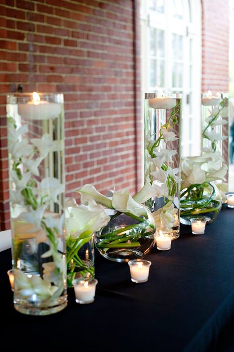 like the white orchids with the floating candle, and the cala lillies in the fish bowl. Submersible Centerpieces, White Orchid Centerpiece, Orchid Centerpieces Wedding, Orchid Bowl, Calla Lily Centerpieces, Lily Centerpieces, Centerpiece Diy, Calla Lily Wedding, Orchid Centerpieces