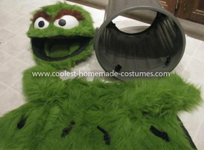 Coolest Oscar the Grouch Child Costume 8: My two-year-old daughter decided to be Oscar the Grouch for Halloween 2011. The costume includes the head (like a helmet), a jacket, and the garbage can. Sesame Street Halloween, Sesame Street Halloween Costumes, Halloween Costumes Family, Poppy Costume, Eve Costume, Homemade Costume, Oscar The Grouch, Homemade Costumes, Dog Halloween Costumes