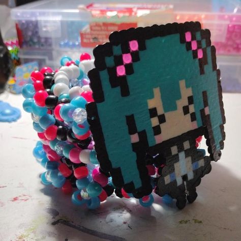 Look what I just bought on Depop 🙌 https://depop.app.link/3JDNVAMBKxb Miku Kandi, Rotating Kandi Cuff, 3d Kandi Cuff, 3d Kandi, Rave Kandi Ideas, Rave Kandi, Kandi Inspo, Diy Kandi Bracelets, Diy Kandi