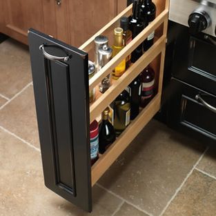 Base Liter Pull-Out - The roll-out bottle drawer is the perfect place for all your favorite oils, cooking wines, or other tall bottles up to... Kitchen Bottle Pull Out, Bottle Pull Out Drawer, Pull Out Oil Cabinet, Tall Kitchen Drawer, Bar Remodel, Installing Kitchen Cabinets, Luxury Kitchen Cabinets, Under Cabinet Storage, Traditional Kitchen Cabinets