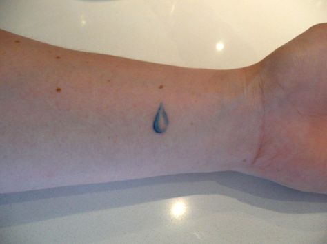 Raindrop tattoo Teardrop Tattoo Design, Eye Tattoo Wrist, Rain Tattoos, Water Drop Tattoo, Teardrop Tattoo, Rain Tattoo, Tattoo Nature, Tattoo Wrist, Water Tattoo