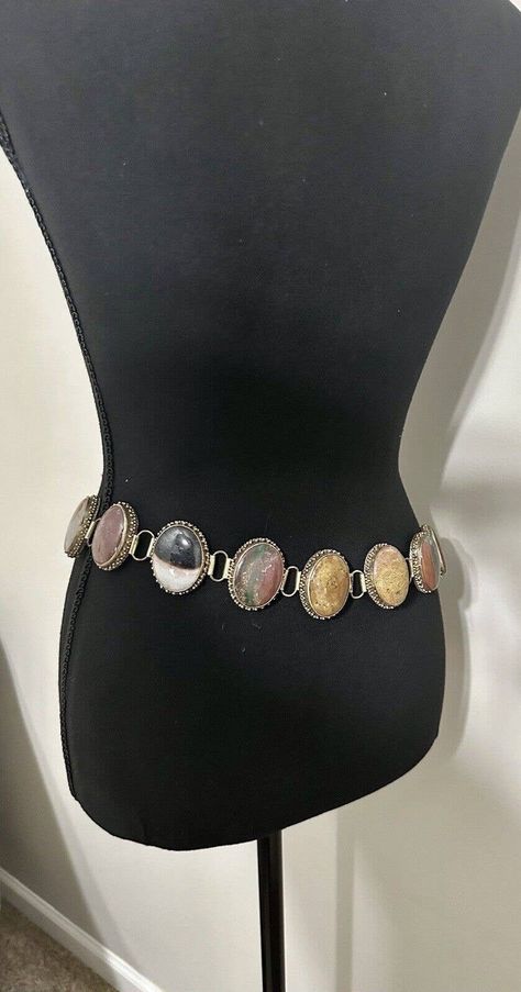 This vintage boho belt is perfect for any fashion-forward woman who wants to make a statement. The belt features smooth stones in the Southwestern Navajo style, adding a touch of ancient culture to your outfit. The boho style of the belt makes it perfect for casual wear or even dressing up for a night out. The belt is made of high-quality materials and is sure to last for years to come. It is perfect for any woman who wants to add a touch of elegance to her wardrobe. The stone accents are sure t Black Belt Outfit, Navajo Clothing, Style Manifestation, 2024 Clothes, Boho Belt, Statement Belt, Navajo Style, Boho Belts, Personal Style Inspiration