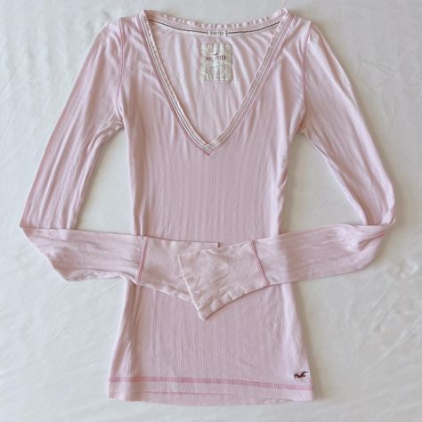 Hollister baby pink ribbed slim fit v neck long... - Depop Lacy Shirt, Thrift Manifest, 2023 Wishlist, V Neck Long Sleeve Top, Fashion Coquette, Top With Lace Trim, 2000s Clothes, Pink Ribbed, Thrift Finds