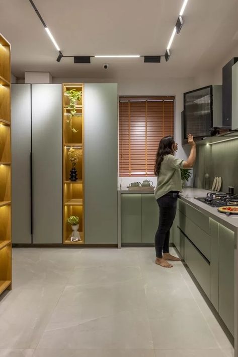 Kitchen Showcase Design with a Twist of Wardrobe Display | J Architects - The Architects Diary Kitchen Showcase, Hardware Display, Living Room Designs India, Wardrobe Display, Kitchen Cabinetry Design, Living Room Decor Lights, Modern Kitchen Cabinet Design, Wardrobe Designs, Kitchen Wardrobe