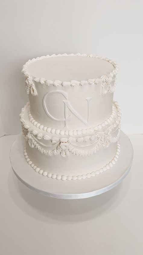 We made this classic wedding cake design with vintage piping techniques. We also included the couples’ initials at the front of the cake! #weddingcake #vintagecake #classiccake #vintagepiping Old School Piping Wedding Cake, Wedding Cake With Piping, Vintage Piping Cake, Wedding Cake With Name, Piped Wedding Cake, Wedding Cake Piping, Piping Cake, New Cake Design, Initial Cake