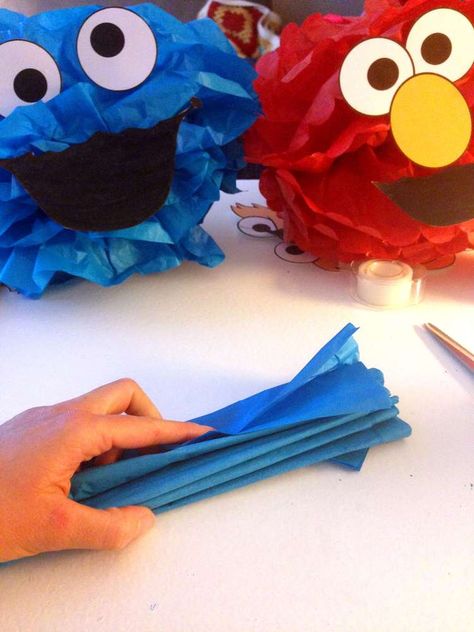 The Best Sesame Street Theme Party | CatchMyParty.com Sesame Street Classroom Theme, Diy Sesame Street Decorations, Sesame Street Centerpiece Ideas, Elmo Decorations, Sesame Street Crafts, Sesame Street Decorations, Sesame Street Centerpiece, Sesame Street Birthday Party Ideas Boy, Elmo Birthday Party Boy