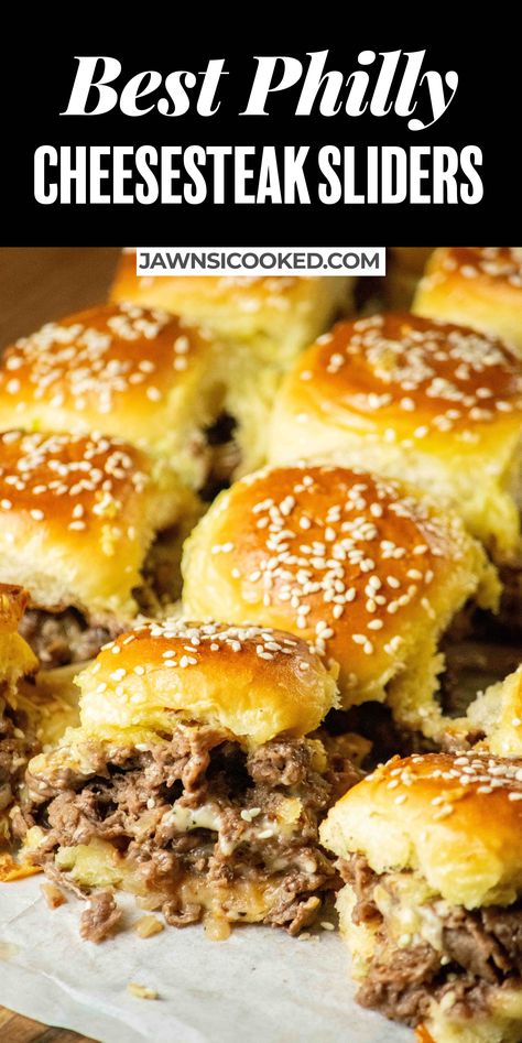 A Philly Cheese Steak Slider recipe, from a Philly girl! Loaded with thinly sliced steak, fried onions, 2 kinds of cheese, and baked to perfection with a garlic butter and sesame seeds! Cheese Steak Sliders, Philly Cheesesteak Sliders Recipe, Steak Sliders, Philly Cheesesteak Sliders, Cheesesteak Sliders, Philly Cheese Steak Sliders, Famous Food, Cheese Steak, Philly Cheese