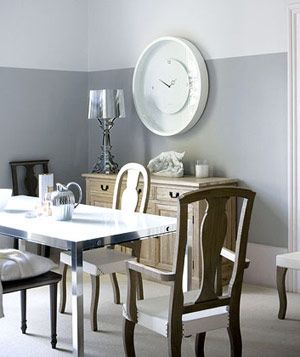 Expert tips and stylish color pairings make it easy to integrate this neutral shade into your decor. Popular Grey Paint Colors, Gray Flooring, Home Renovation Loan, Two Tone Walls, Paint Room, White Clock, Chrome Table, Grey Lavender, Grey Dining Room