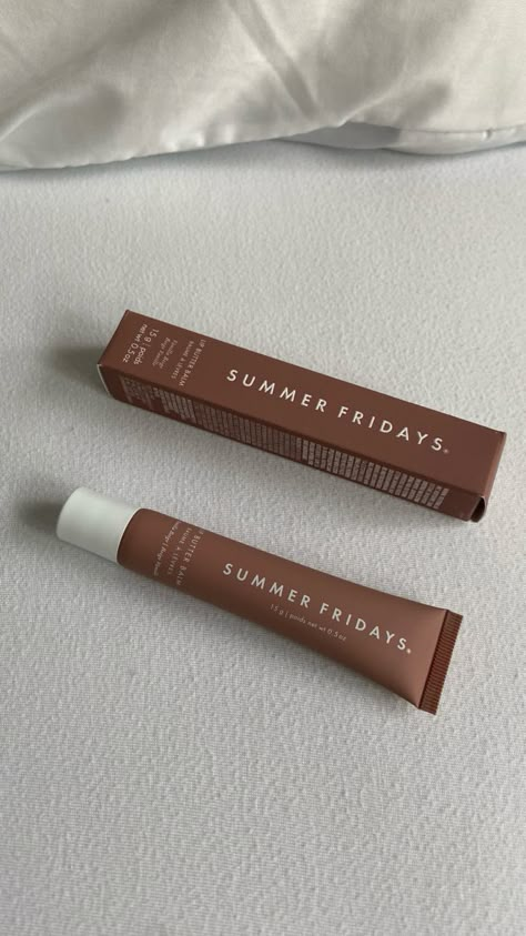 Summer fridays lip balm, summer fridays lip butter balm, summer fridays aesthetic, summer friday lip balm vanilla beige, summer friday lip balm aesthetic, summer fridays vanilla, summer fridays lip gloss lying on white sheets on a bed parallel to each other Summer Friday Vanilla Beige, Vanilla Summer Fridays, Summer Fridays Vanilla, Summer Fridays Vanilla Beige, Summer Fridays Lip Balm Aesthetic, Summer Fridays Aesthetic, Summer Fridays Iced Coffee Lip Balm, Summer Fridays Lip Balm Vanilla Beige, Summer Fridays Lip Balm