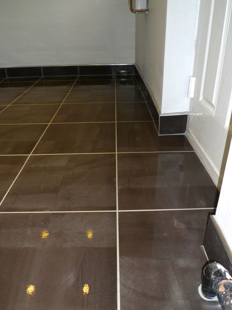 Tiled skirting board with chrome trim Tiled Skirting Boards, Tile Skirting Ideas, Floor Skirting Ideas, Tiled Skirting, Tiles Skirting, Tile Mosaic Floor, Tile Skirting, Oak Floor Living Room, Tile Baseboard