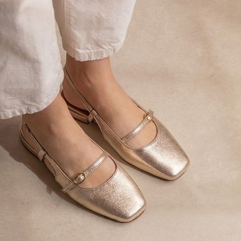 • GOLD • Step up your style game with our BERTILLE flat Mary Janes in dazzling gold by @maisontoufet! ✨ ⁠ ⁠ Designed in France and handcrafted in Portugal, these beauties are all about timeless glam and that sense of Parisian chic. And guess what? Mary Janes are totally trending right now! ⁠ ⁠ Perfect for adding some sparkle to any look, these babies will have you shining from day to night.⁠ ⁠ Ready to dip your toe in? Over half our stock has already SOLD OUT so don't wait around to get your ... Mary Jane Flats With Leather Sole, Spring Mary Jane Ballet Flats With Leather Sole, Flat Mary Janes, Elegant Gold Ballet Flats With Leather Sole, Gold Mary Janes, Gold Leather Slip-on Ballet Flats, Mary Jane Flats, Parisian Chic, Mary Janes