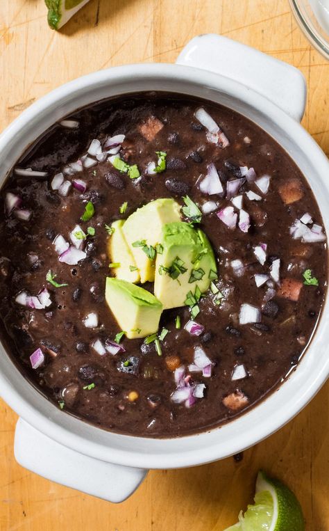 Black Bean Soup: Dried beans add more flavor to this hearty soup than canned, and don’t even need to soak for hours as with many other recipes. To tenderize and infuse the beans with smoky flavor, we simmer them in water with ham steak and bay leaves. Easy Skillet Dinner, Black Bean Soup Recipe, Donut Toppings, Cooks Country, Soup Crockpot, Cookie Toppings, Bean Soup Recipe, Pork Soup, America's Test Kitchen Recipes