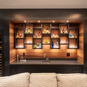 Bar Walls Ideas For Home, Poolhouse Bar Ideas, Black Bar In Basement, Behind Bar Ideas, Bar Against Wall Basement, Basement Bar Rustic, Bar And Tv Room Ideas, Basement Bar Game Room, Basement Bar Shelves